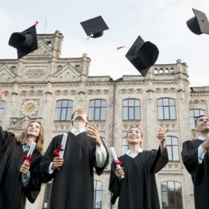 graduation-concept-with-student-throwing-hats-air_23-2148201878